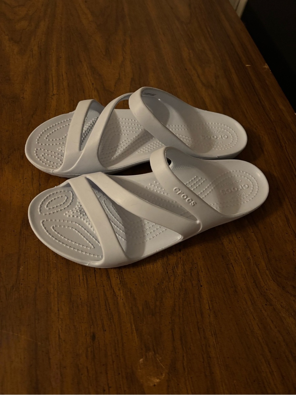 CROCS Womenās baby blue Slide Sandals with Triple-Strap Design